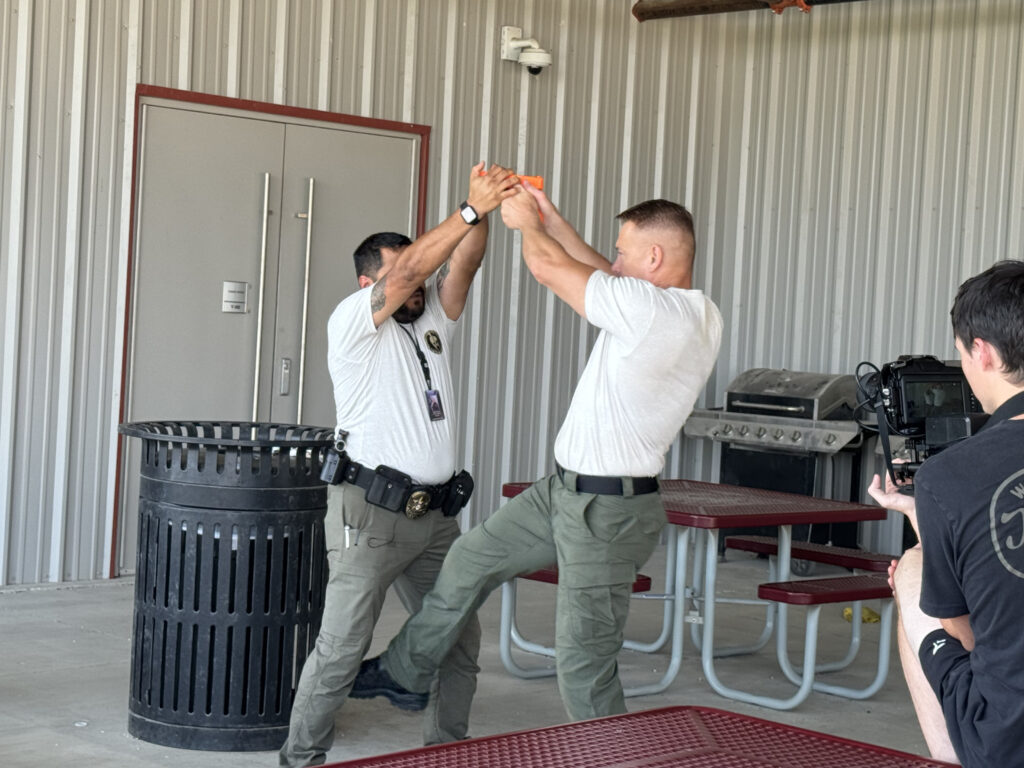 Vincible training photo of two men sparring.